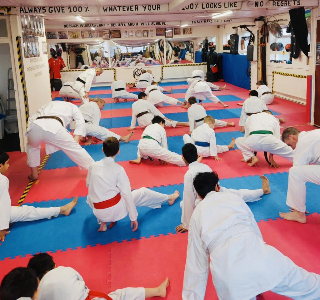 KSD karate students leg stretching exercise