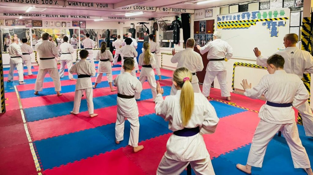 KSD karate students in kamae stance position